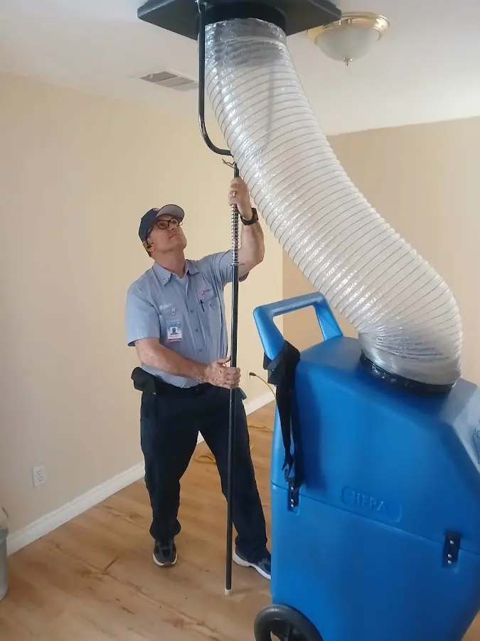 HVAC Installation technician using HEPA equipment in Grayson